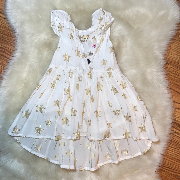 white dress with gold stars